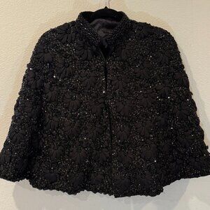 Vintage Black Beaded and Embroidered Wool Sequin Cape with small hook fasteners.